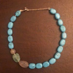 Turquoise necklace with lobster claw with adjustable chain.